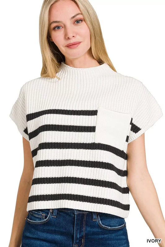 Woman wearing short sleeve ivory knit sweater with black horizontal stripes and chest pocket