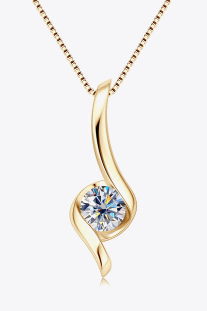 Elegant gold pendant necklace with twisted design and a round clear gemstone