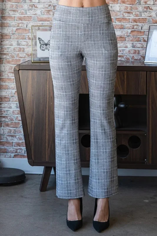 Women's high-waisted gray plaid dress pants with straight leg fit, styled with black heels.
