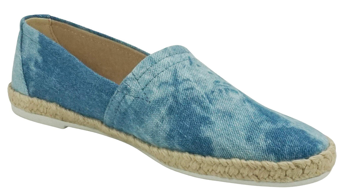 Side profile of comfortable slip-on shoes with beautiful bohemian jute wrap detailing and a round toe.