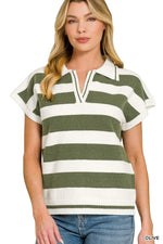 Woman wearing an olive and white striped short sleeve knit top with collar and split neckline