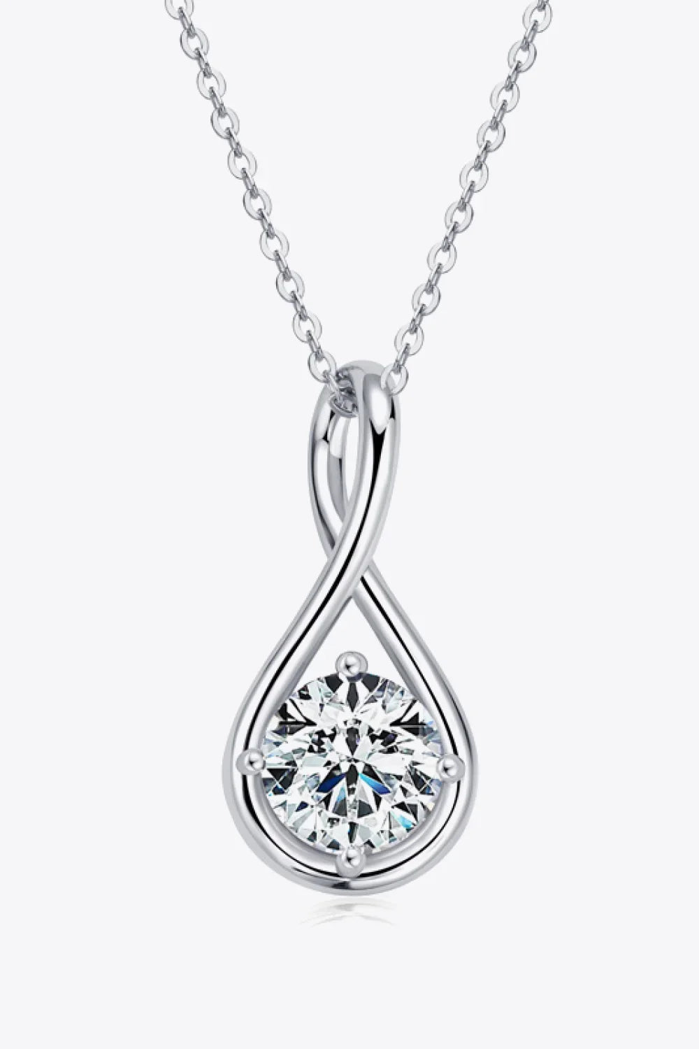 Silver teardrop necklace with a round clear gemstone pendant on a fine chain, minimalist style
