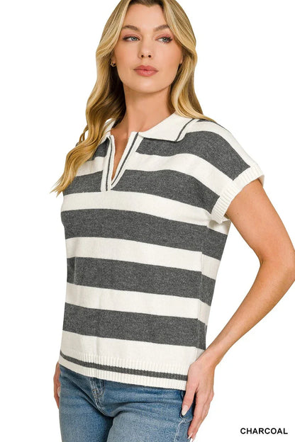 Woman wearing a short sleeve charcoal and white striped knit polo top with collar