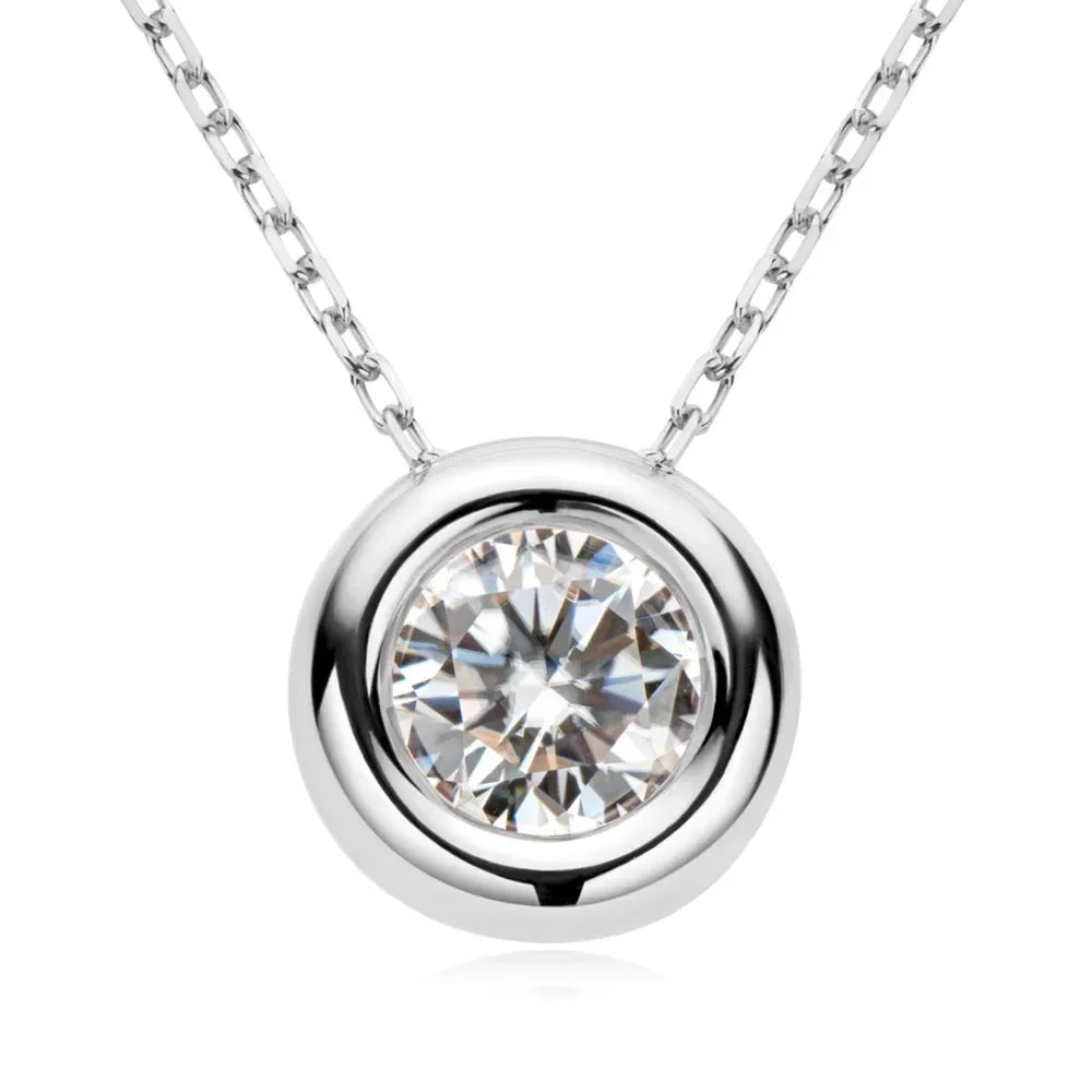Round solitaire pendant necklace with bezel-set clear gemstone on silver chain
