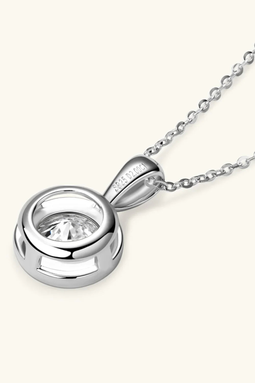 Sterling silver chain necklace with round bezel-set solitaire pendant