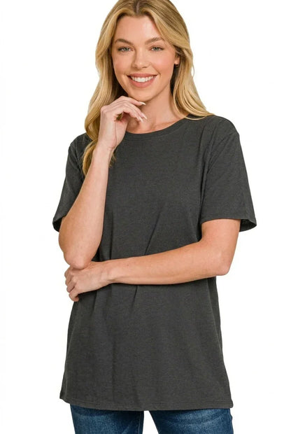 Woman wearing a relaxed fit charcoal grey t-shirt with jeans, casual style
