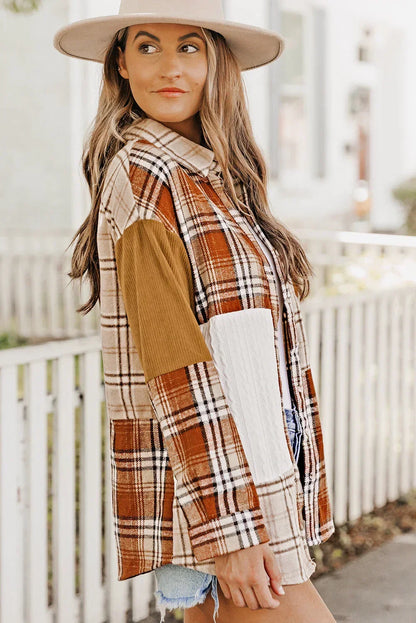 Woman in beige hat wearing a patchwork plaid shacket with corduroy sleeves outdoors