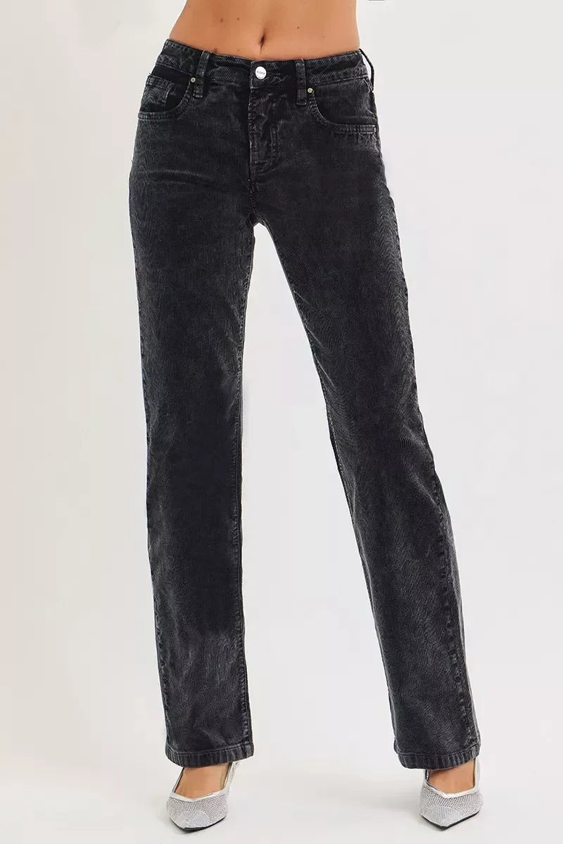 High-waisted black straight-leg corduroy pants for women, styled with silver flats