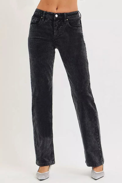 High-waisted black straight-leg corduroy pants for women, styled with silver flats