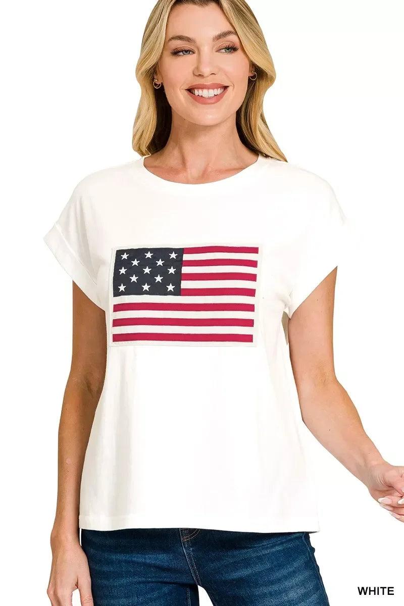 Woman wearing a white t-shirt with American flag graphic, casual denim style