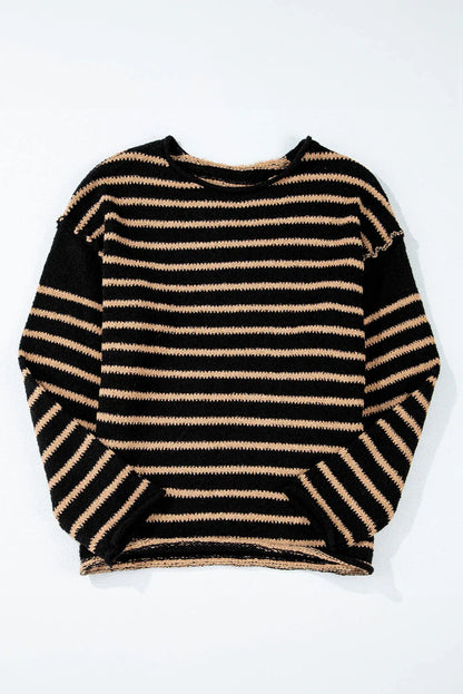 Black and beige striped long sleeve sweater with a relaxed, modern fit on a white background.