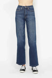 High-rise wide leg jeans with classic blue wash, styled with black sneakers.