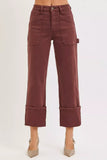 Women's high-waisted brown wide-leg pants with large front pockets and cuffed hem
