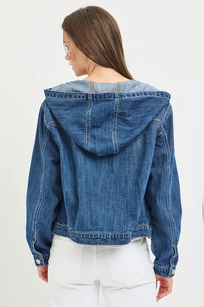 back view of a woman wearing a button-up Denim Jacket with Hoodie and white jeans on a white background