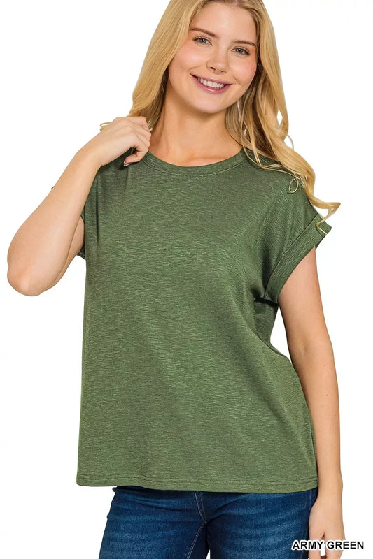 Woman wearing an army green short sleeve relaxed fit t-shirt and blue jeans