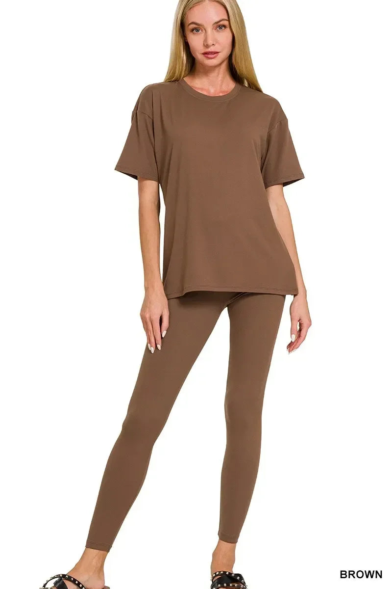 Woman wearing a brown short-sleeve t-shirt and matching brown leggings set