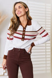 Woman wearing a white ribbed knit top with brown and red stripes, brown collar, and brown high-waisted pants