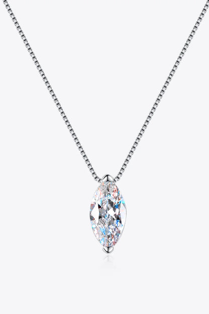 Silver chain necklace with marquise-cut clear gemstone pendant on white background