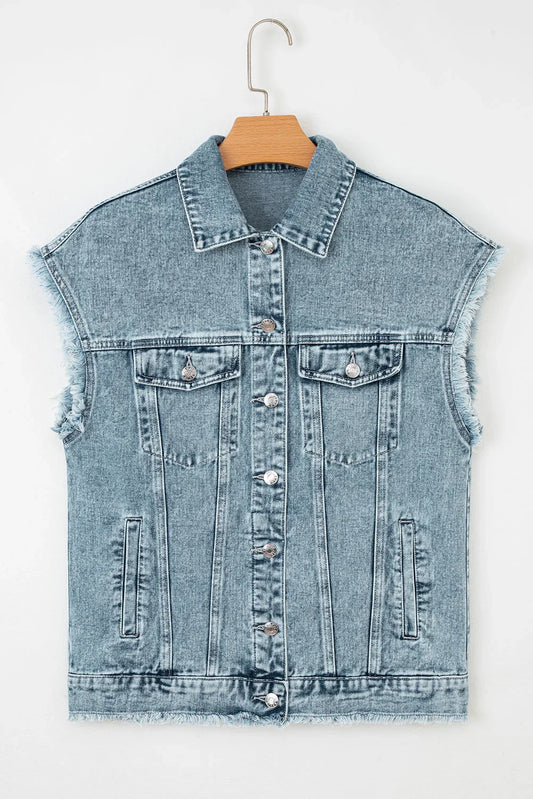 Sleeveless light wash denim vest with frayed edges and button front on hanger