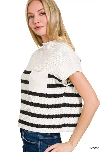 Woman wearing ivory knit short-sleeve sweater with black stripes and chest pocket