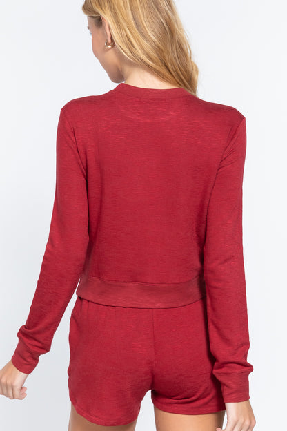 the back of a Woman wearing a red Long Sleeve Crew Neck Slub Terry Top with matching shorts on a white background