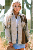 Woman wearing a colorblock houndstooth and knit jacket with denim skirt outdoors