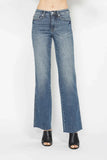 Wide-leg blue denim jeans with faded wash, styled with black open-toe heeled sandals.