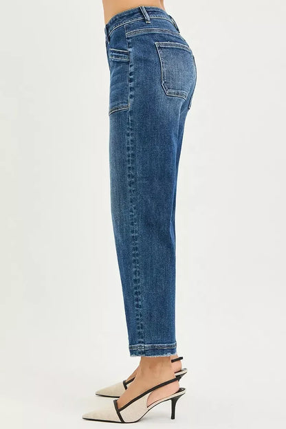Side view of woman wearing high-waisted blue straight-leg jeans and heels