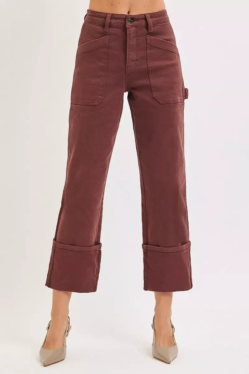 High-waisted cropped maroon pants with front patch pockets and wide cuffed hems for women