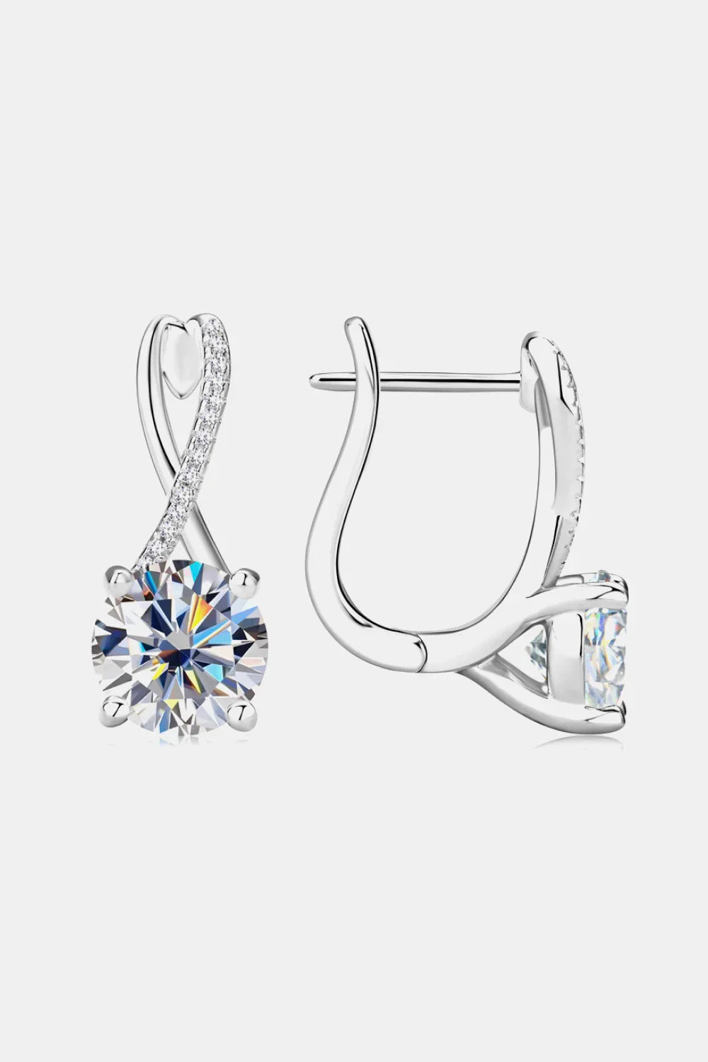 Silver drop earrings with cubic zirconia round stone and pavé details on a white background.