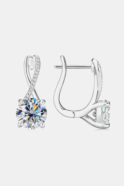 Silver drop earrings with cubic zirconia round stone and pavé details on a white background.